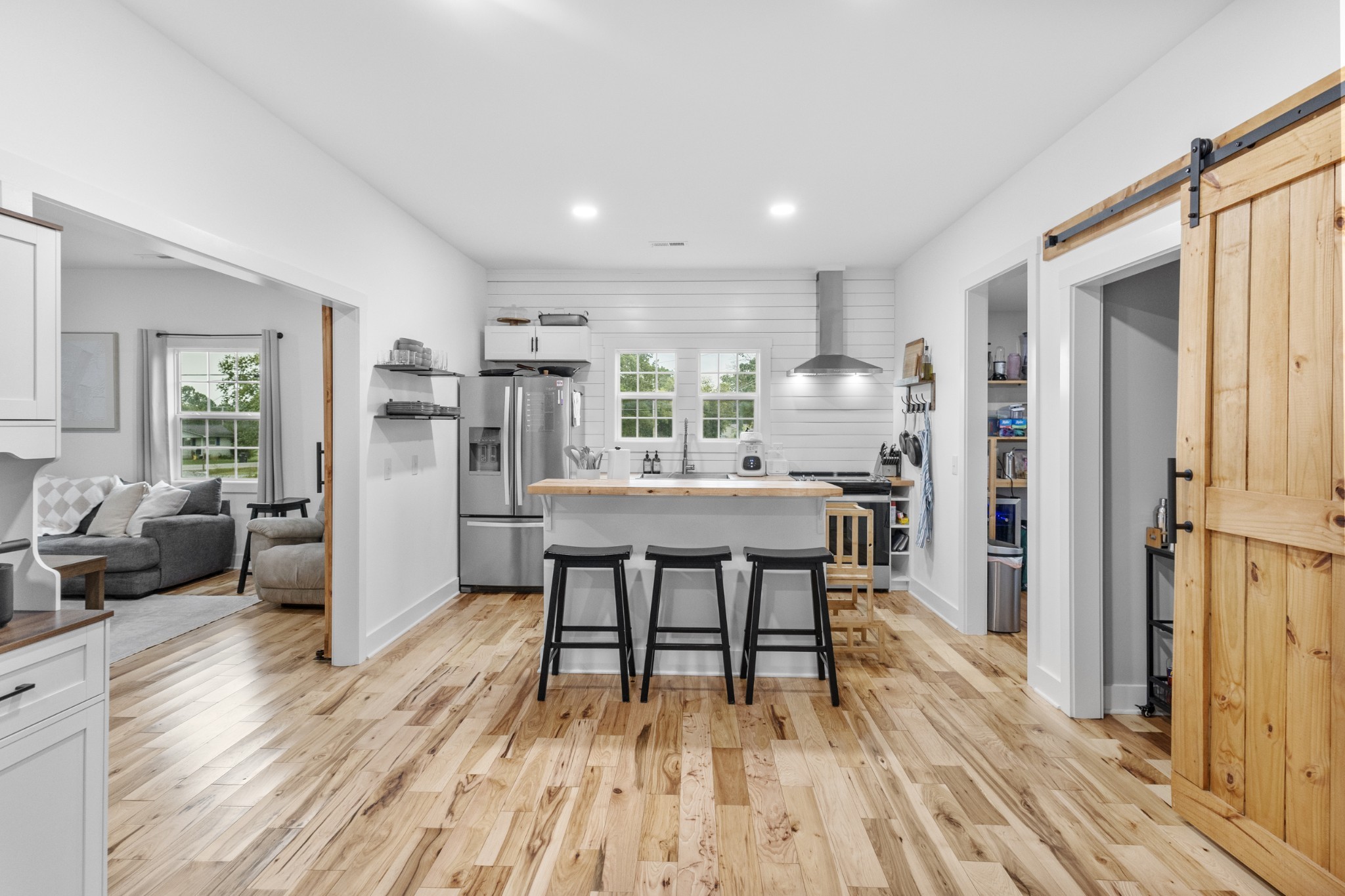 607 Old Columbia Road Unionville, TN 37180 - Photo 15 of 46 a view of a dining room with furniture and wooden floor