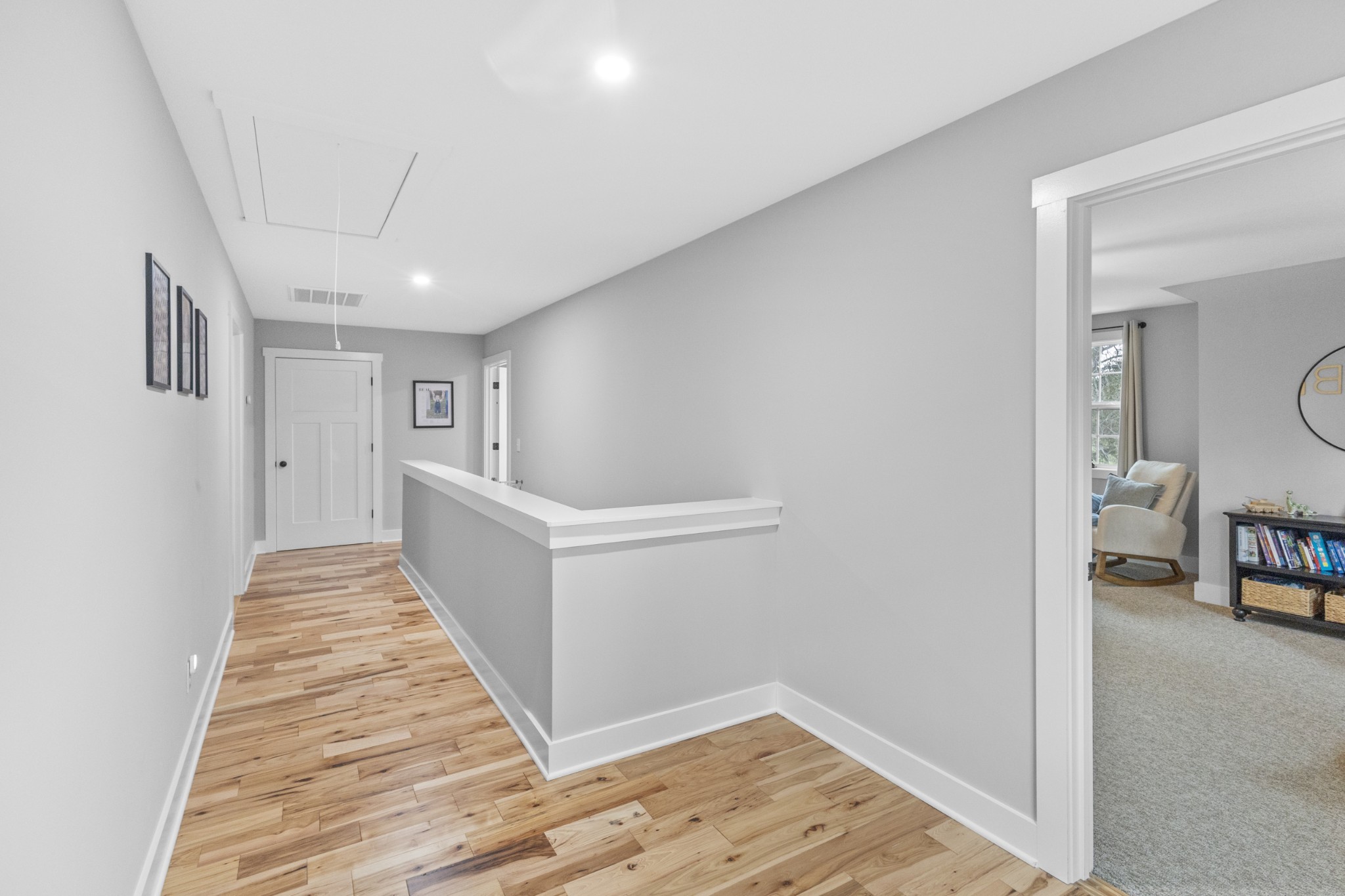 607 Old Columbia Road Unionville, TN 37180 - Photo 31 of 46 a view of a hallway with wooden floor and dining room