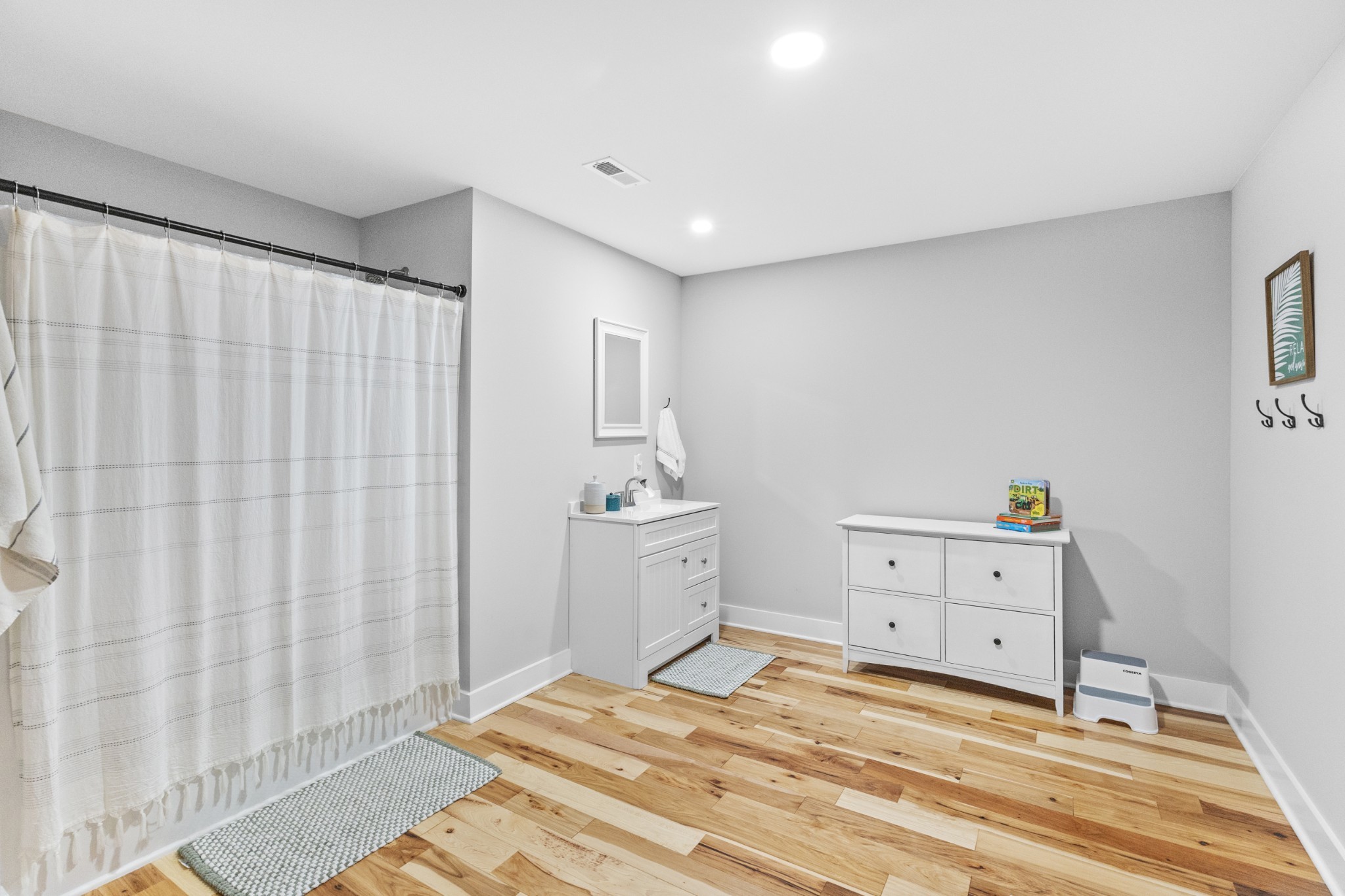 607 Old Columbia Road Unionville, TN 37180 - Photo 35 of 46 a room with a baby crib and a dresser