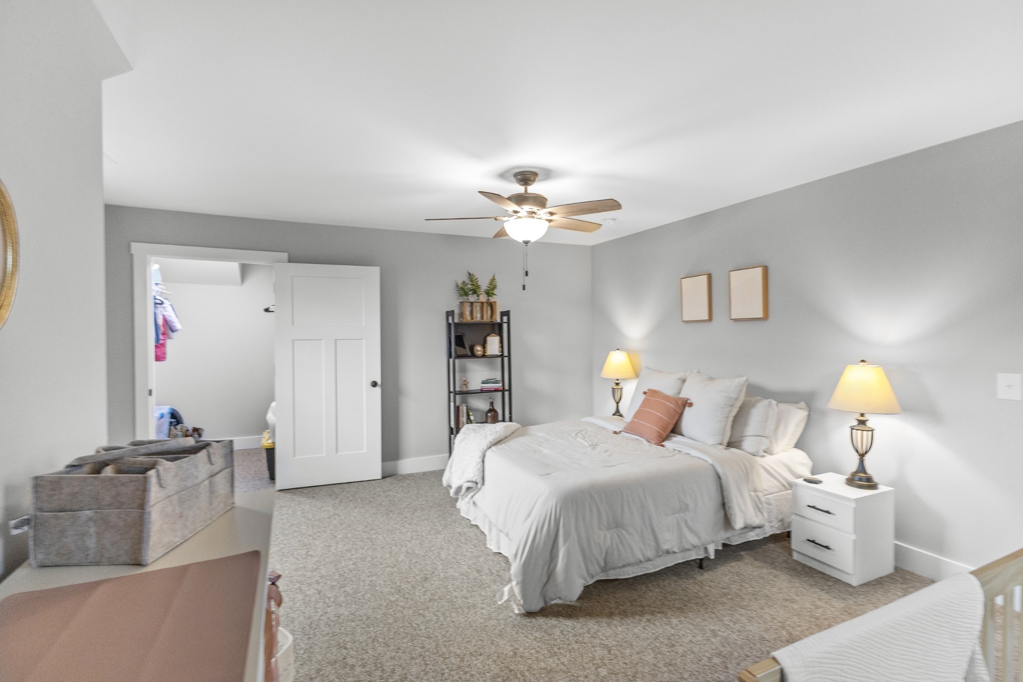 607 Old Columbia Road Unionville, TN 37180 - Photo 36 of 46 a bedroom with a bed and a chandelier