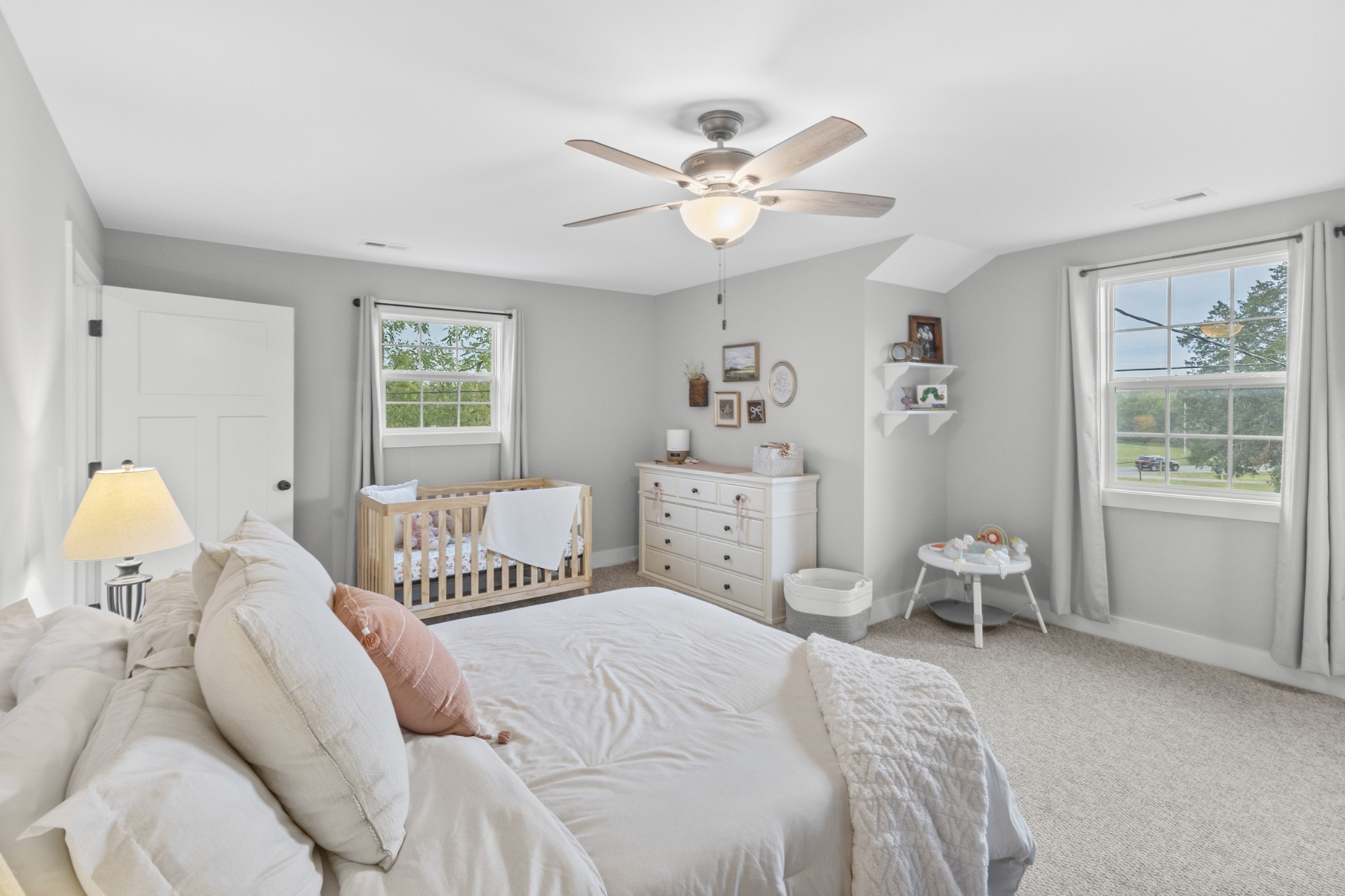 607 Old Columbia Road Unionville, TN 37180 - Photo 37 of 46 a bedroom with a bed and wooden floor