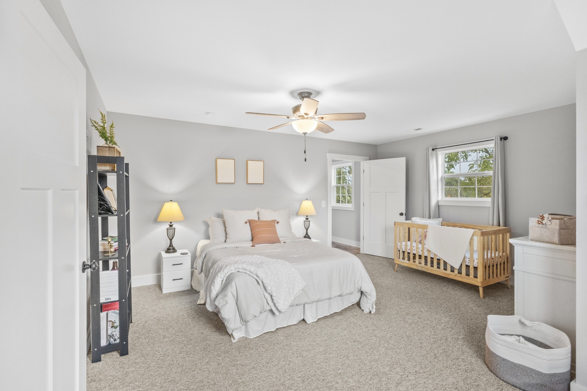 607 Old Columbia Road Unionville, TN 37180 - Photo 38 of 46 a bedroom with a bed and a chandelier