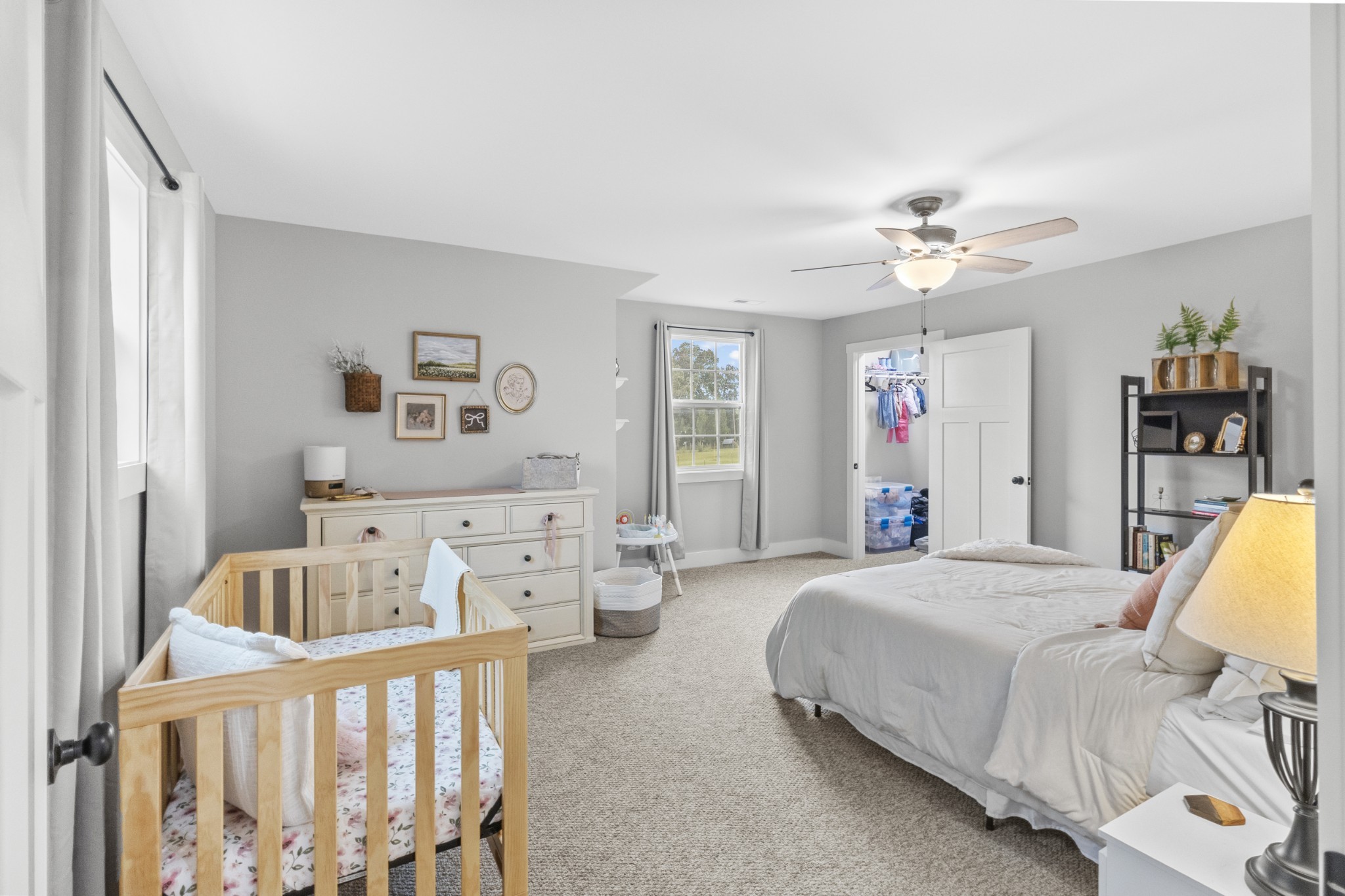 607 Old Columbia Road Unionville, TN 37180 - Photo 39 of 46 a spacious bedroom with a bed and a couch