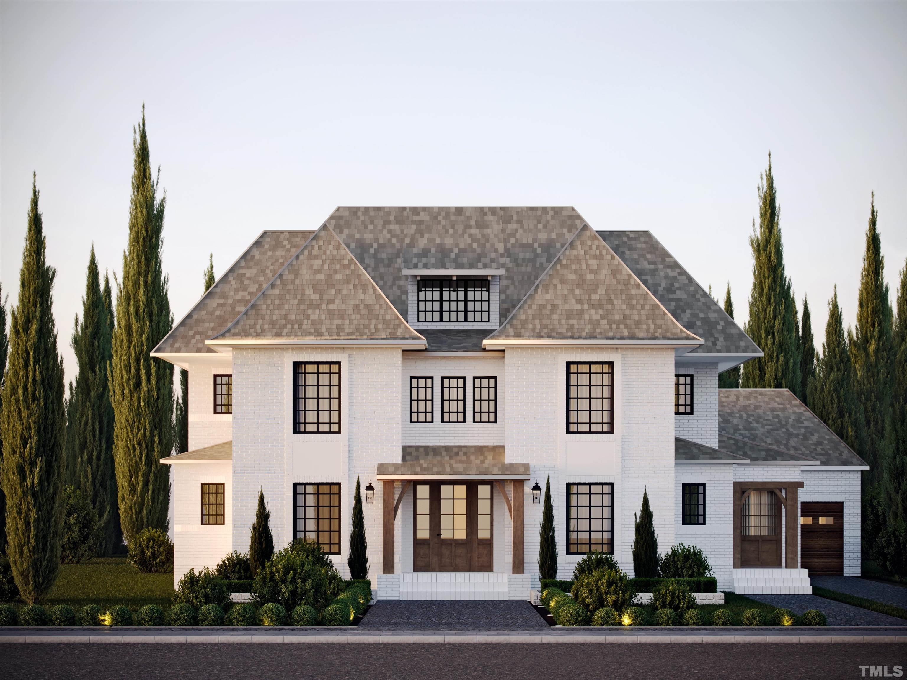 2207 Wheeler Road Raleigh, NC 27607 - Photo 1 of 3 a front view of a house with a garden
