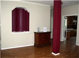 a wooden door in a room
