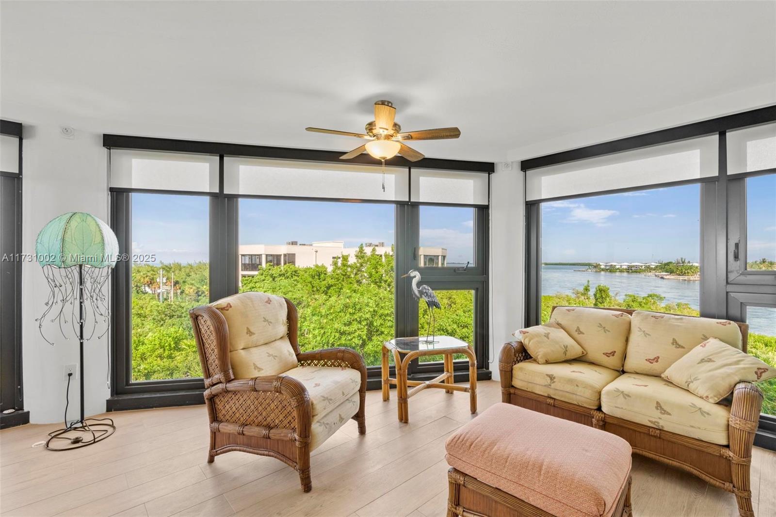 7401 Gulf Of Mexico Boulevard, Unit 4 Marathon, FL 33050 - Photo 8 of 20 a living room with furniture and a large window