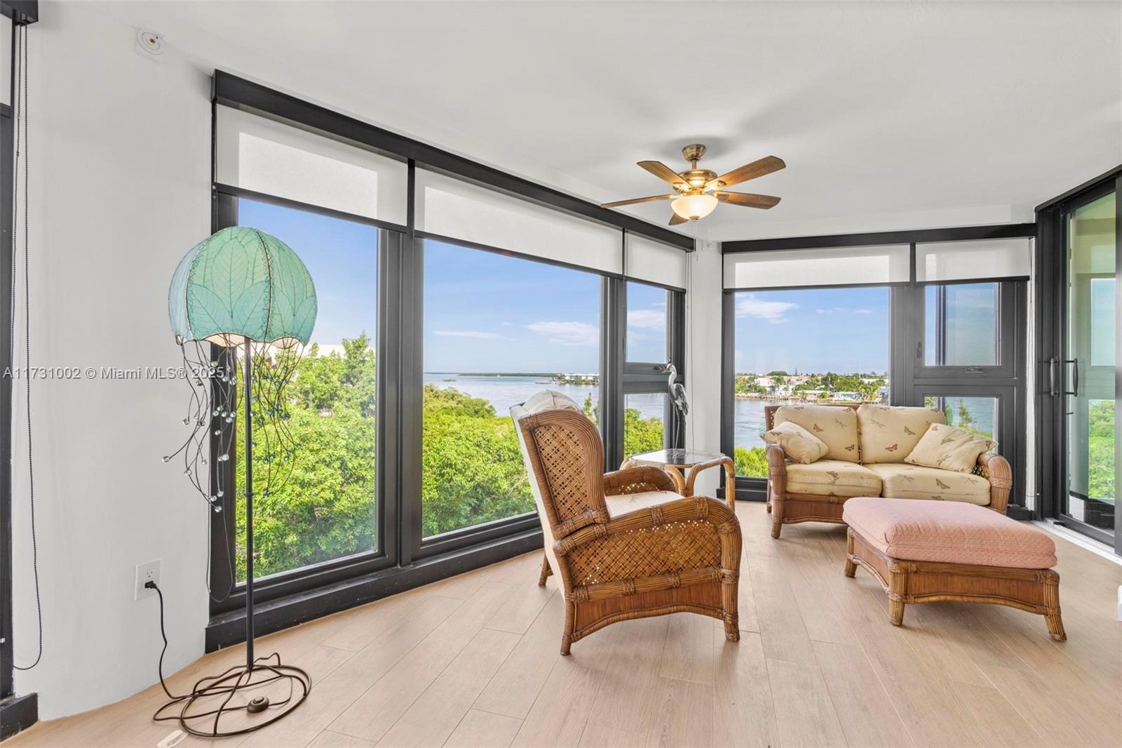 7401 Gulf Of Mexico Boulevard, Unit 4 Marathon, FL 33050 - Photo 9 of 20 a living room with furniture and a large window