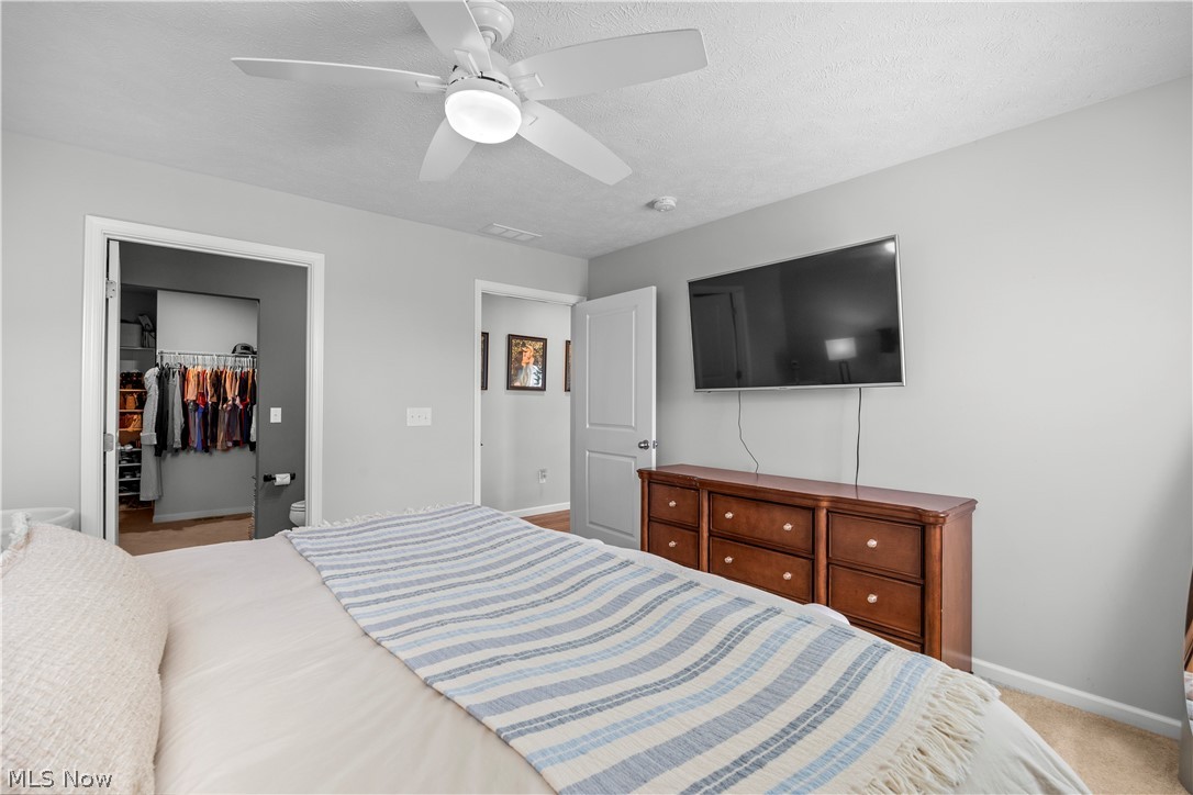 2161 Fowl Road Elyria, OH 44035 - Photo 15 of 46 Light gray walls with a white ceiling fan and light fixture