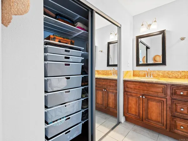 a kitchen with cabinets and appliances