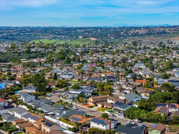 an aerial view of a city with lots of residential buildings