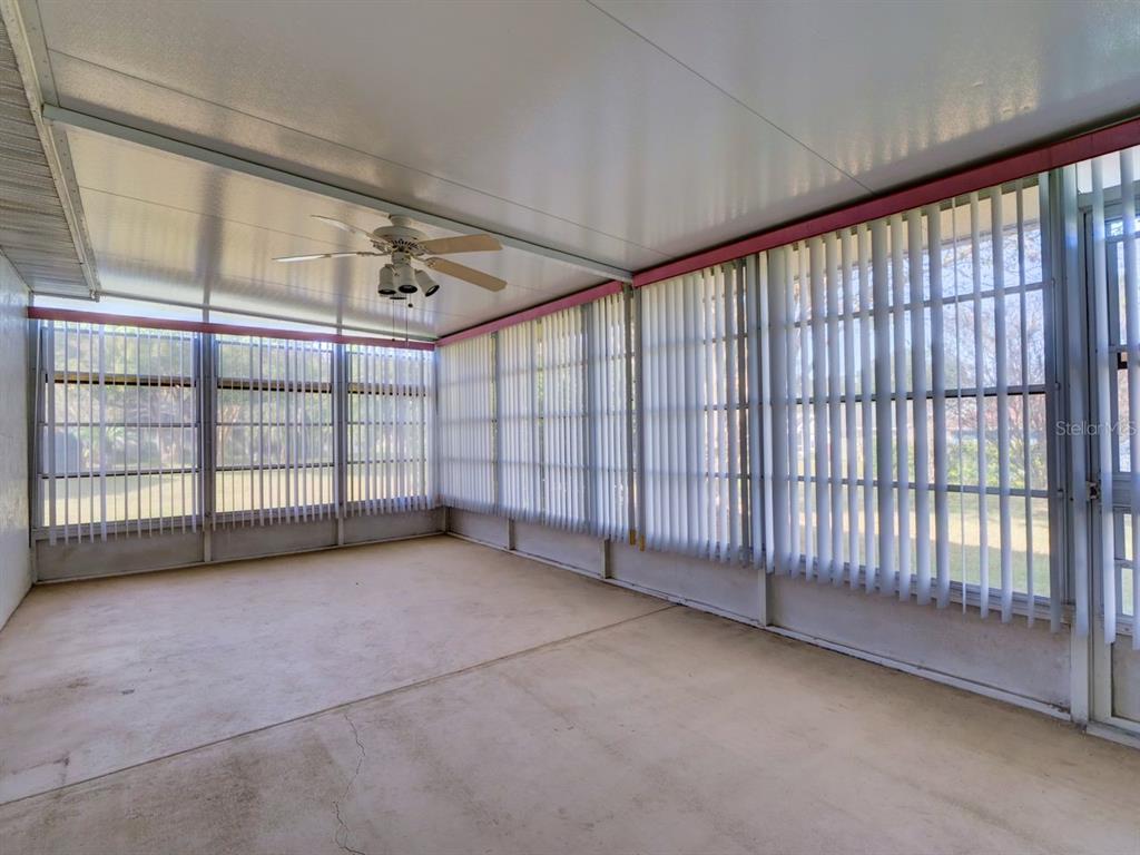 11340 Southwest 76th Circle Ocala, FL 34476 - Photo 21 of 42 a view of a big room with windows
