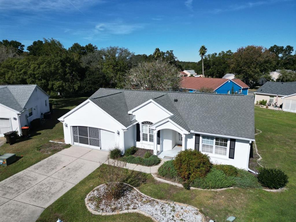 11340 Southwest 76th Circle Ocala, FL 34476 - Photo 25 of 42 a aerial view of a house with a yard