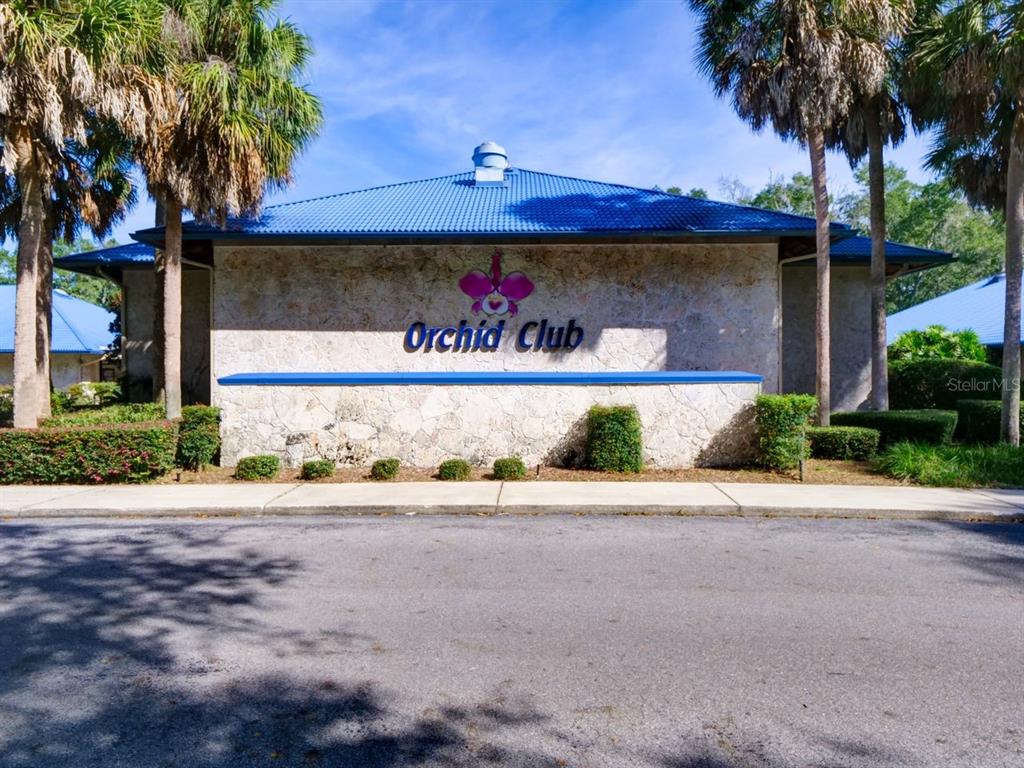 11340 Southwest 76th Circle Ocala, FL 34476 - Photo 39 of 42 a street sign on the side of a building