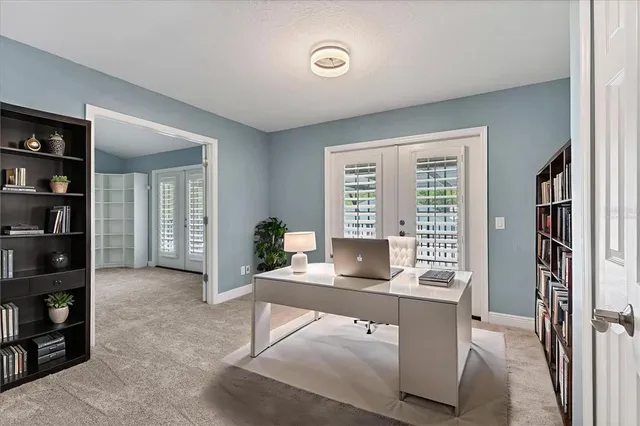 a bathroom with a granite countertop sink toilet tub and shower