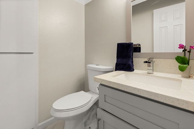 a bathroom with a sink and a toilet