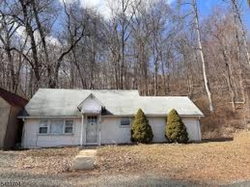 6 Round Valley Road Whitehouse Station, NJ 08889 - Photo 1 of 3 front view of a house with a yard