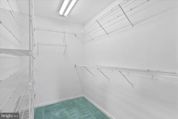 a view of a room with racks on the wall