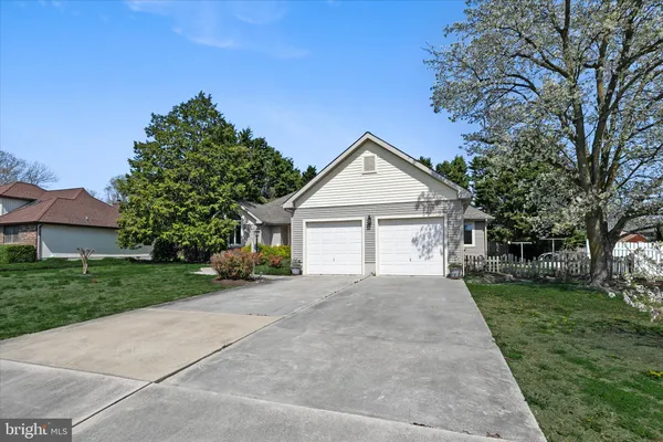 a house view with a garden space