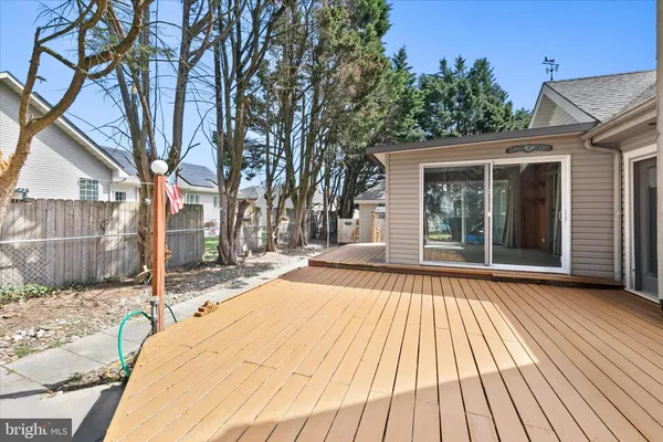 a backyard of a house with outdoor seating