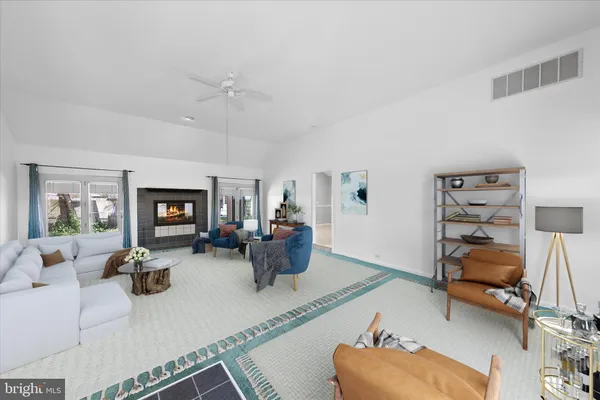 a living room with furniture or couch and a flat screen tv