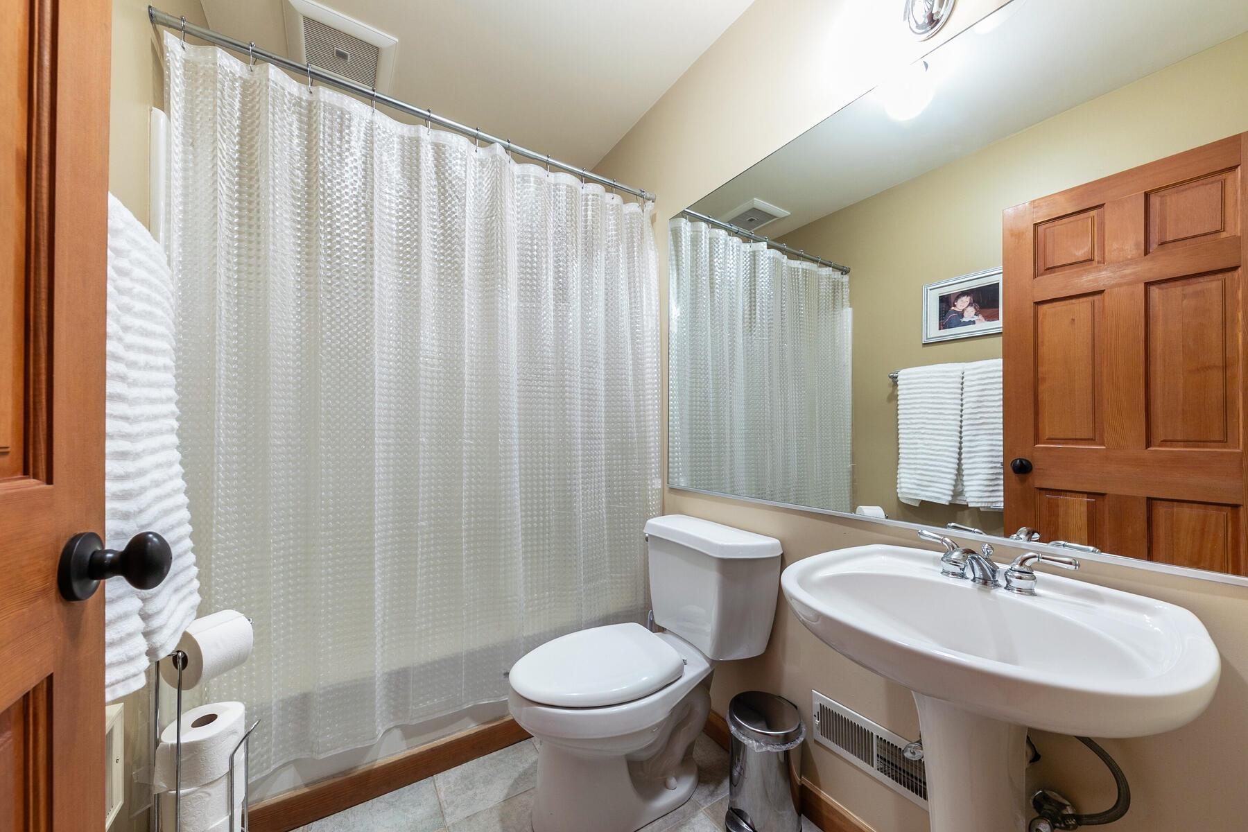 12167 Oslo Drive Truckee, CA 96161 - Photo 19 of 25 a bathroom with a sink toilet and shower