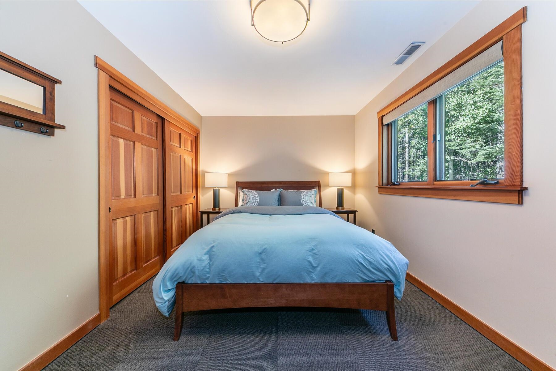 12167 Oslo Drive Truckee, CA 96161 - Photo 20 of 25 a bed sitting in a bedroom next to a window