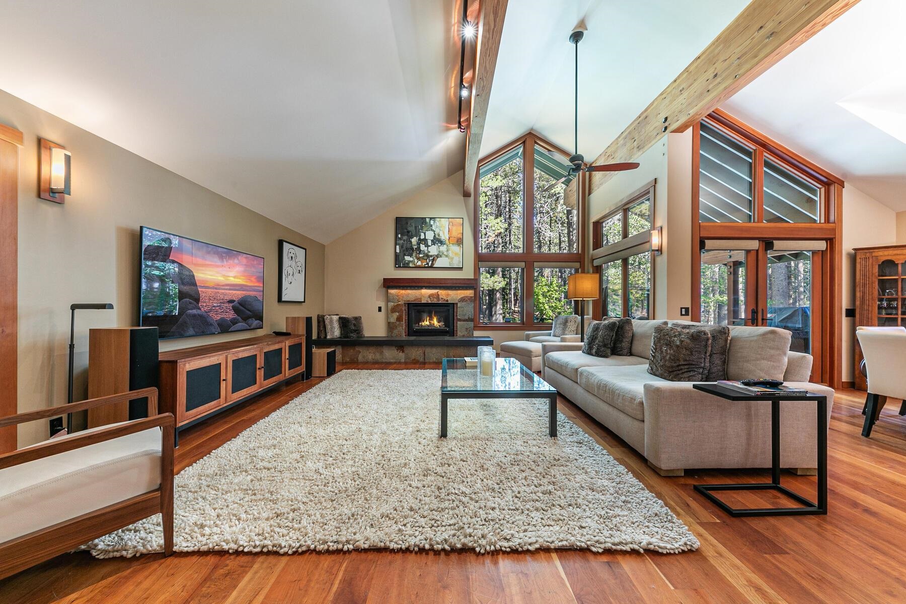 12167 Oslo Drive Truckee, CA 96161 - Photo 9 of 25 a living room with furniture and a flat screen tv