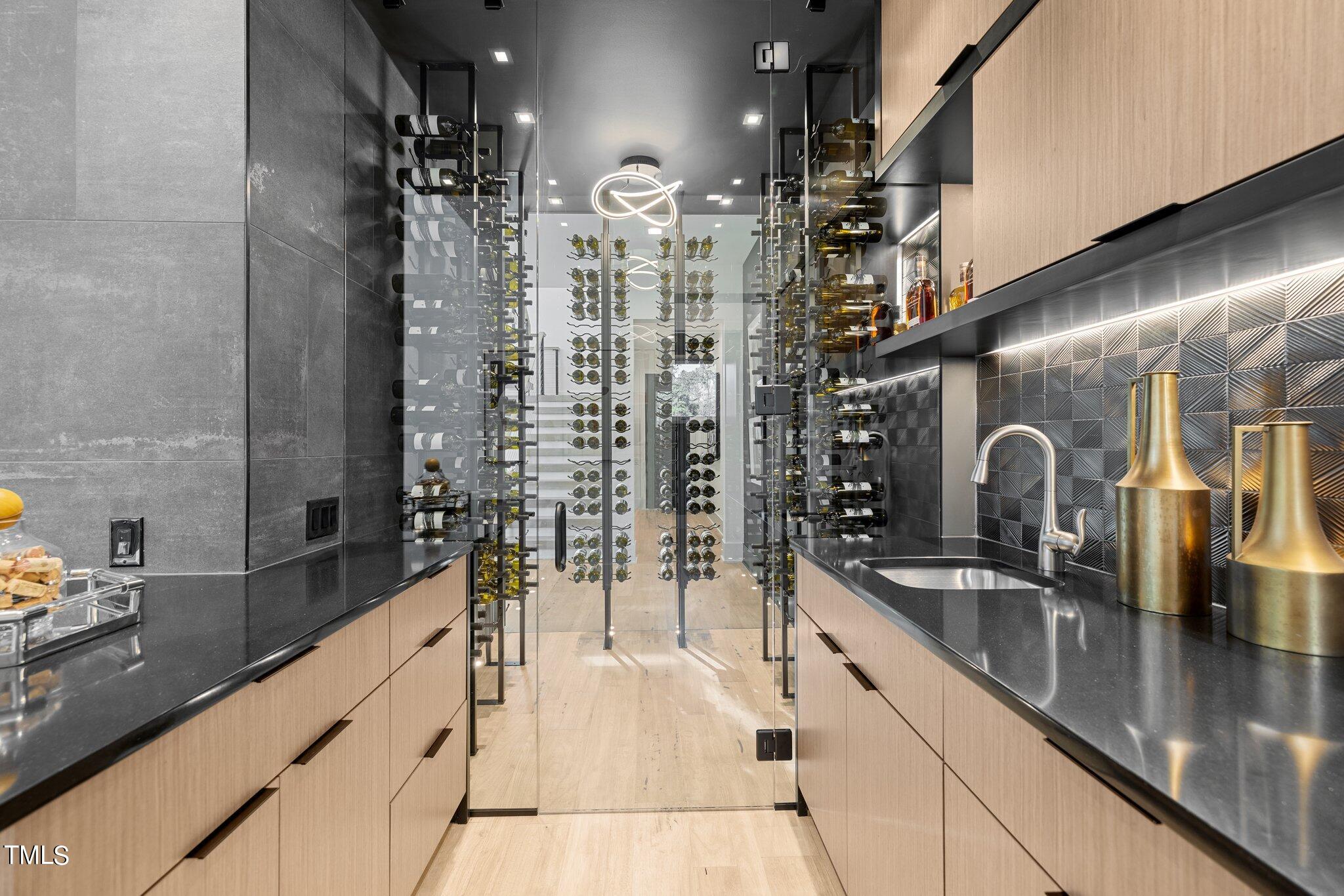 1711 Hunting Ridge Road Raleigh, NC 27615 - Photo 11 of 62 a bathroom with a sink and a shower