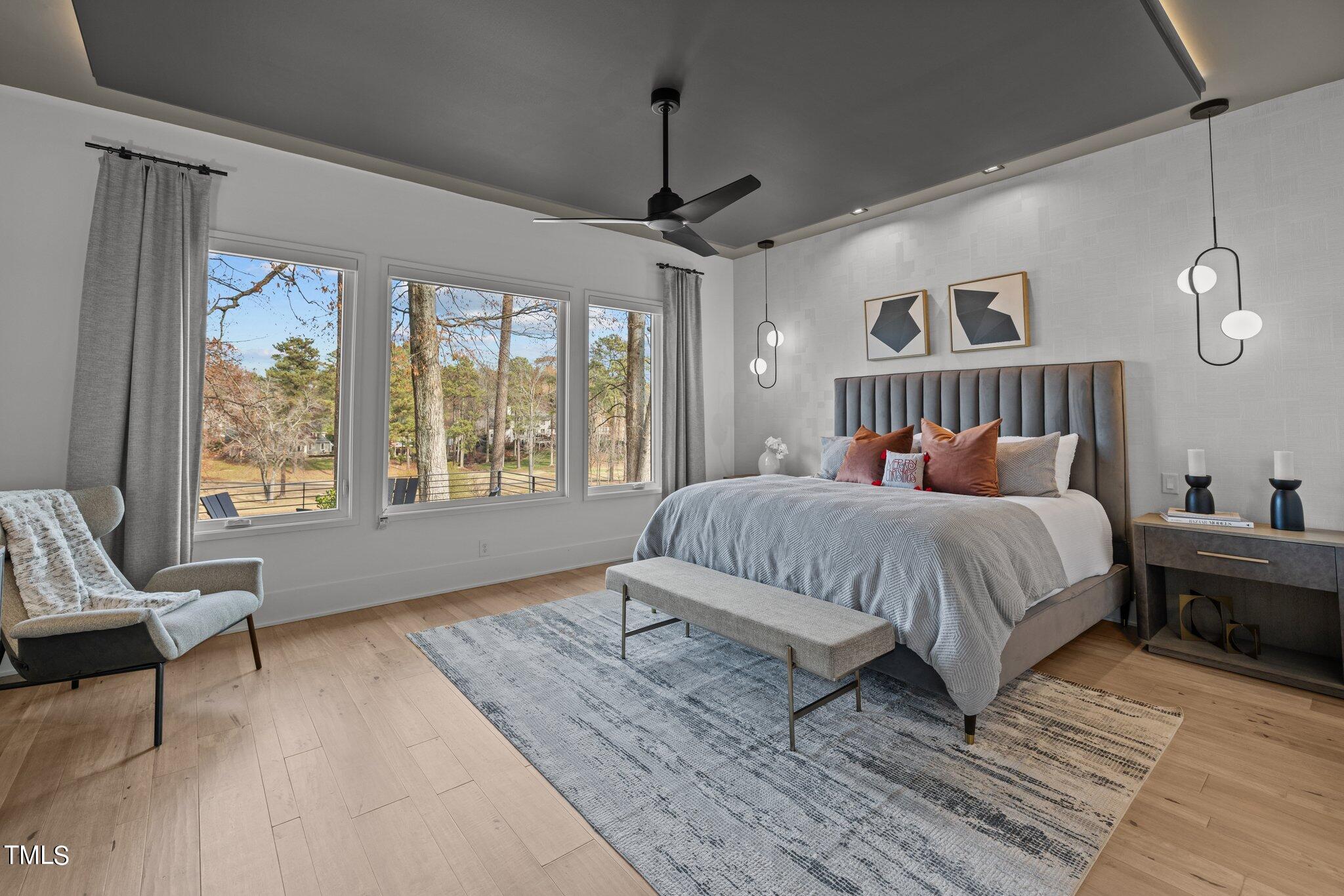 1711 Hunting Ridge Road Raleigh, NC 27615 - Photo 19 of 62 a bedroom with a large bed and a window