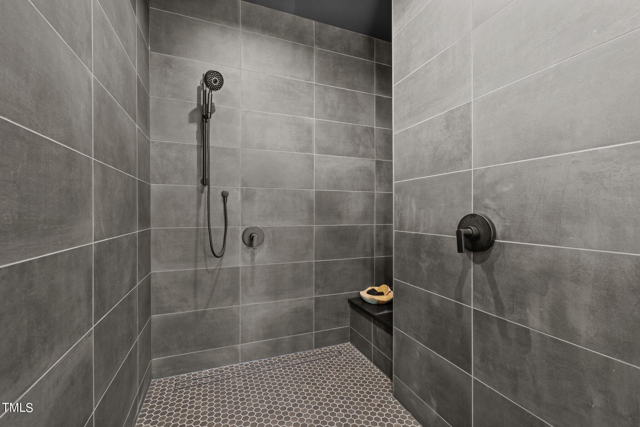 1711 Hunting Ridge Road Raleigh, NC 27615 - Photo 22 of 62 a bathroom with a shower