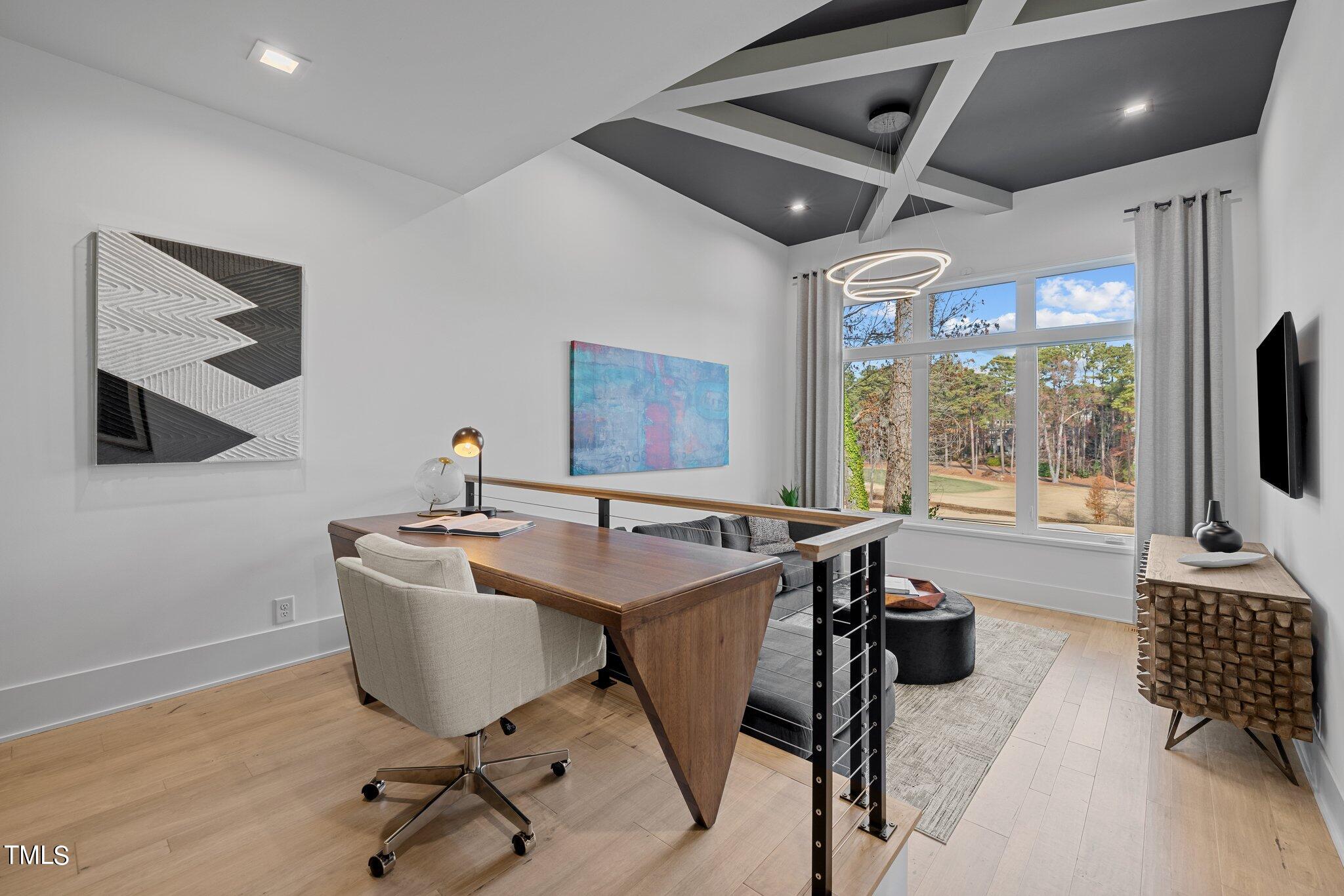 1711 Hunting Ridge Road Raleigh, NC 27615 - Photo 28 of 62 a view of a livingroom with furniture window and outside view