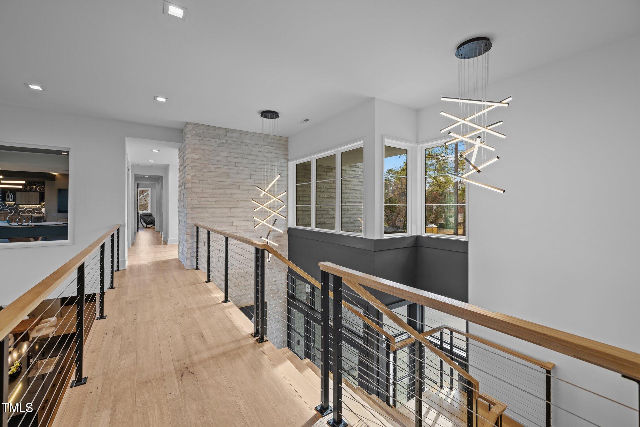 1711 Hunting Ridge Road Raleigh, NC 27615 - Photo 31 of 62 a view of an entryway with wooden floor