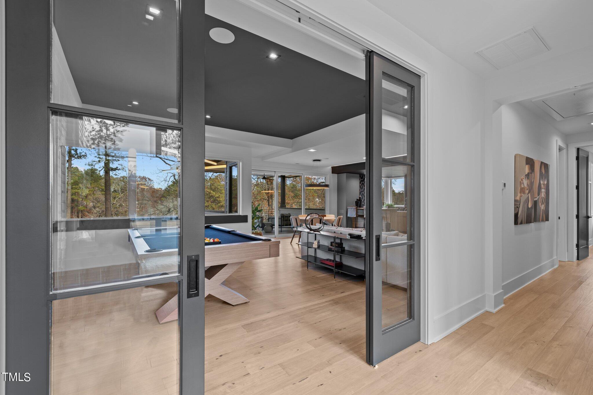 1711 Hunting Ridge Road Raleigh, NC 27615 - Photo 32 of 62 a view of a livingroom with dining room and furniture