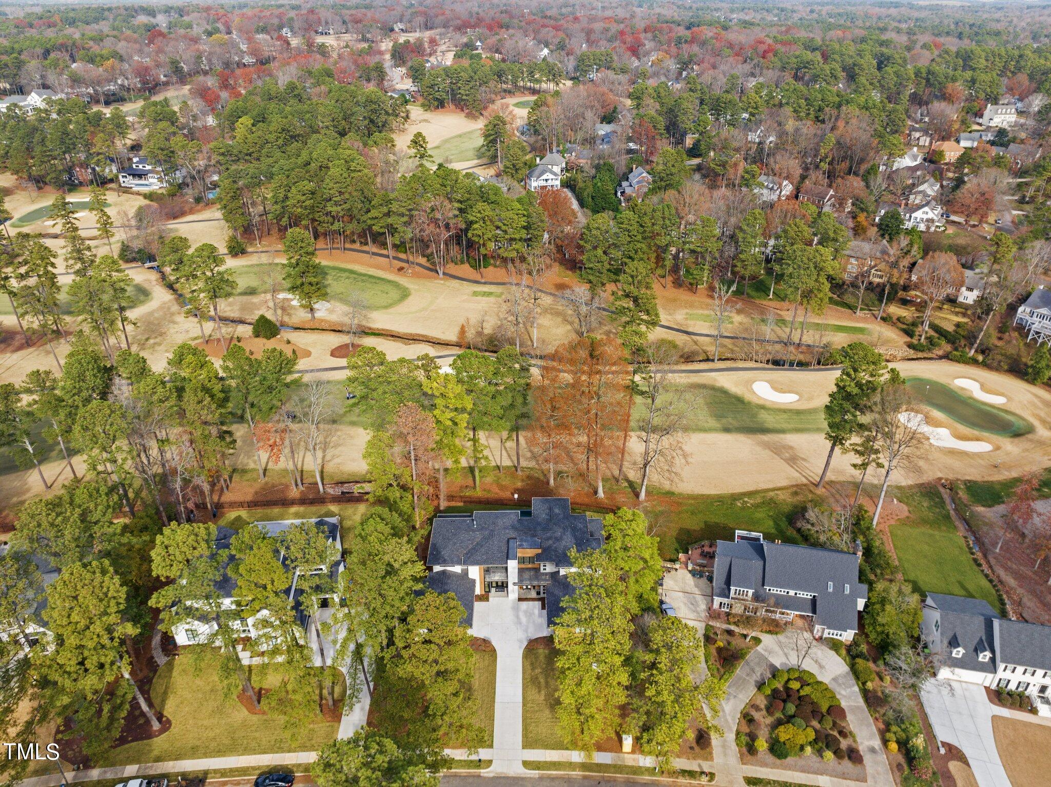 1711 Hunting Ridge Road Raleigh, NC 27615 - Photo 61 of 62 an aerial view of residential houses with outdoor space