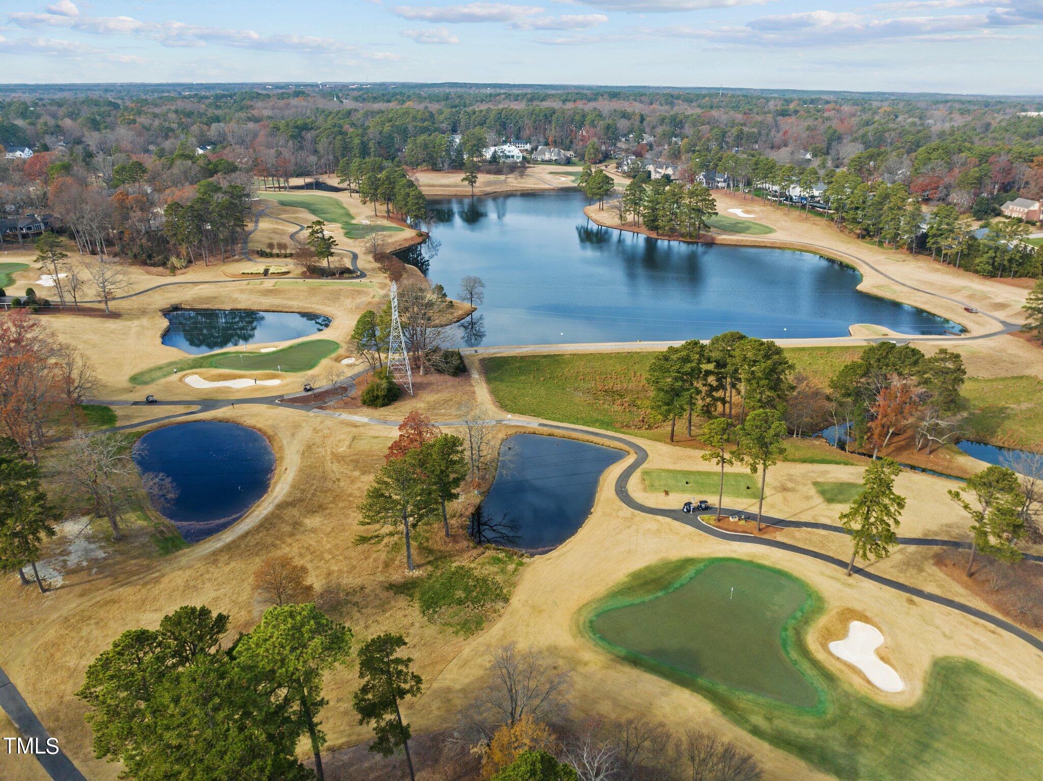 1711 Hunting Ridge Road Raleigh, NC 27615 - Photo 62 of 62 a view of a swimming pool with an ocean view