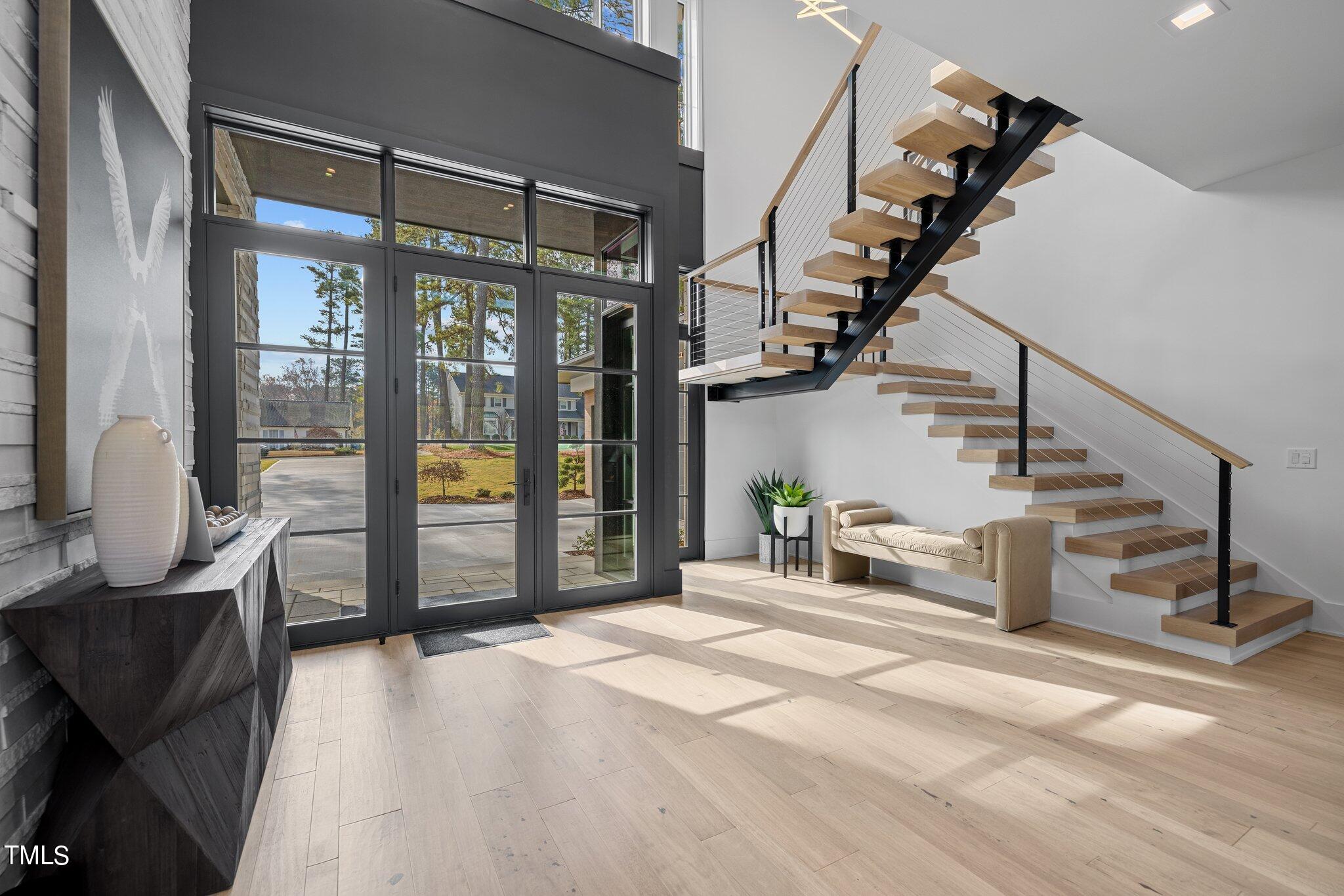 1711 Hunting Ridge Road Raleigh, NC 27615 - Photo 7 of 62 a view of entryway and hall