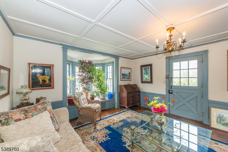 570 Mine Brook Road Bernardsville, NJ 07924 - Photo 14 of 36 a living room with furniture and a window