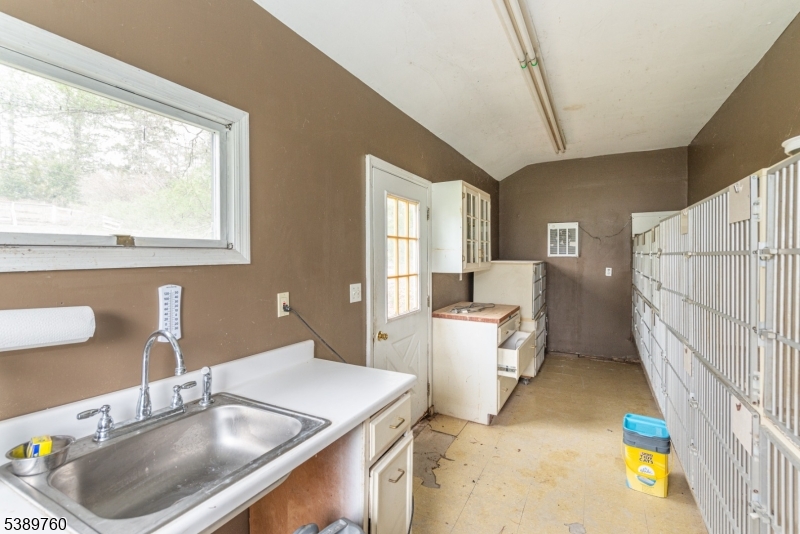 570 Mine Brook Road Bernardsville, NJ 07924 - Photo 28 of 36 a kitchen with a sink cabinets and window