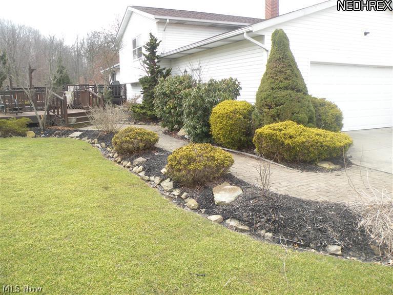 4656 Hattrick Road Ravenna, OH 44266 - Photo 17 of 24 Another view of paved pathway up to deck.