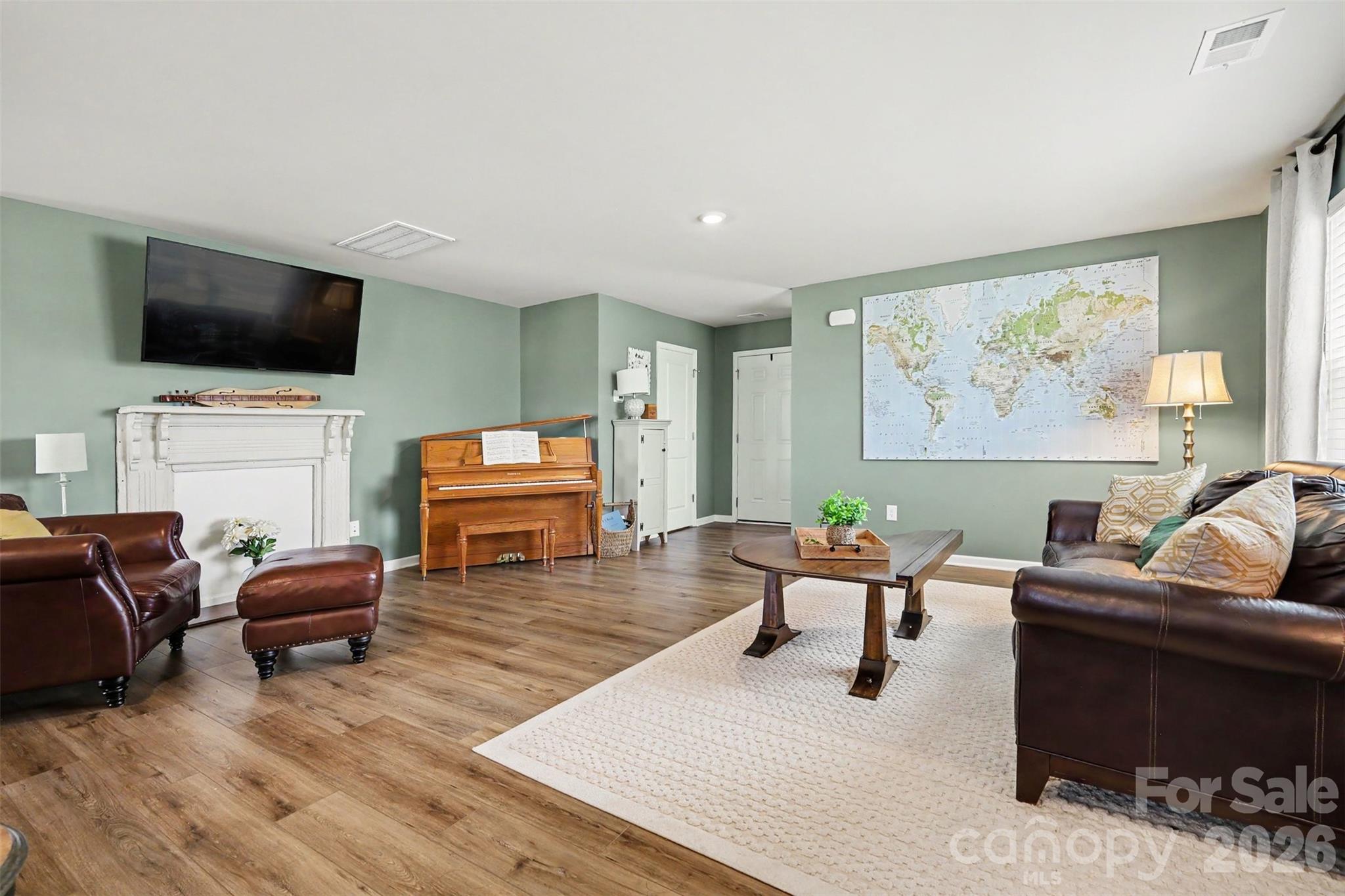 633 Mile Crk Road Edgemoor, SC 29712 - Photo 6 of 26 a living room with furniture and a flat screen tv
