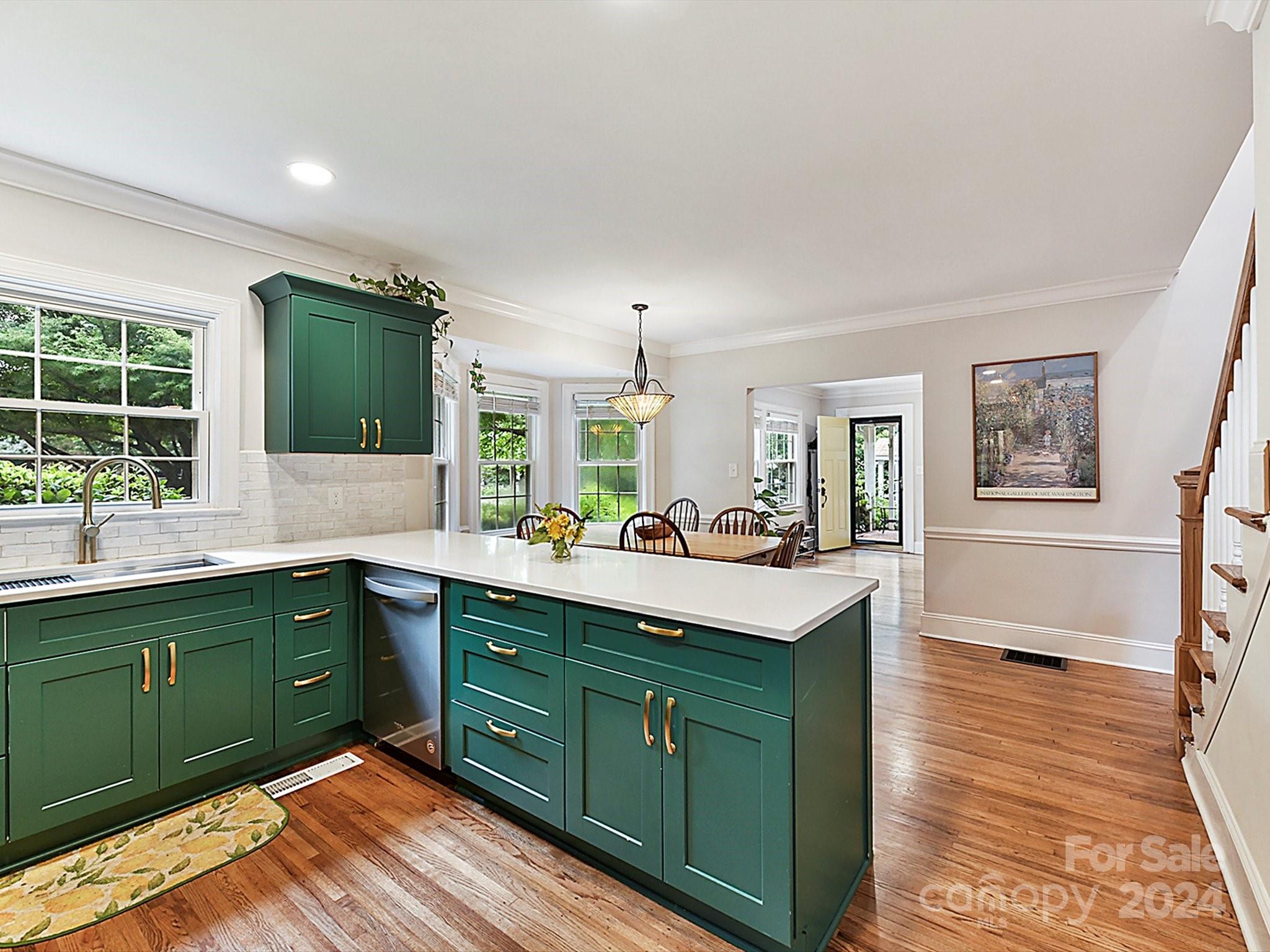 1309 Morningside Drive Charlotte, NC 28205 - Photo 13 of 41 a kitchen with sink and cabinets
