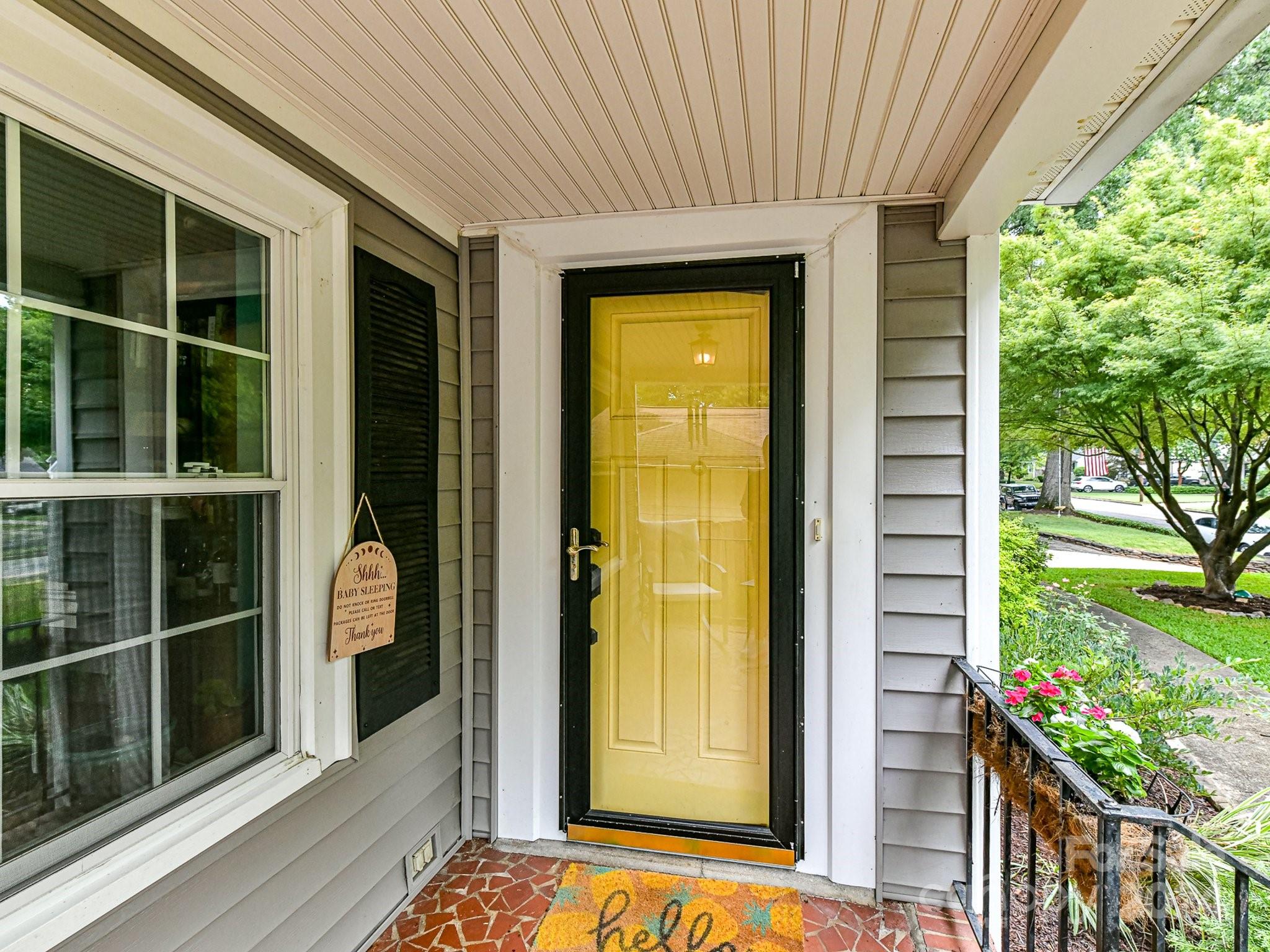 1309 Morningside Drive Charlotte, NC 28205 - Photo 2 of 41 a view of a house with a door and wooden floor