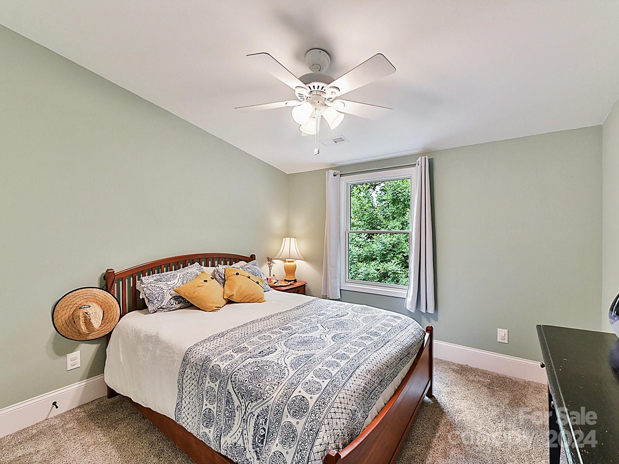 1309 Morningside Drive Charlotte, NC 28205 - Photo 24 of 41 a bedroom with a bed and window