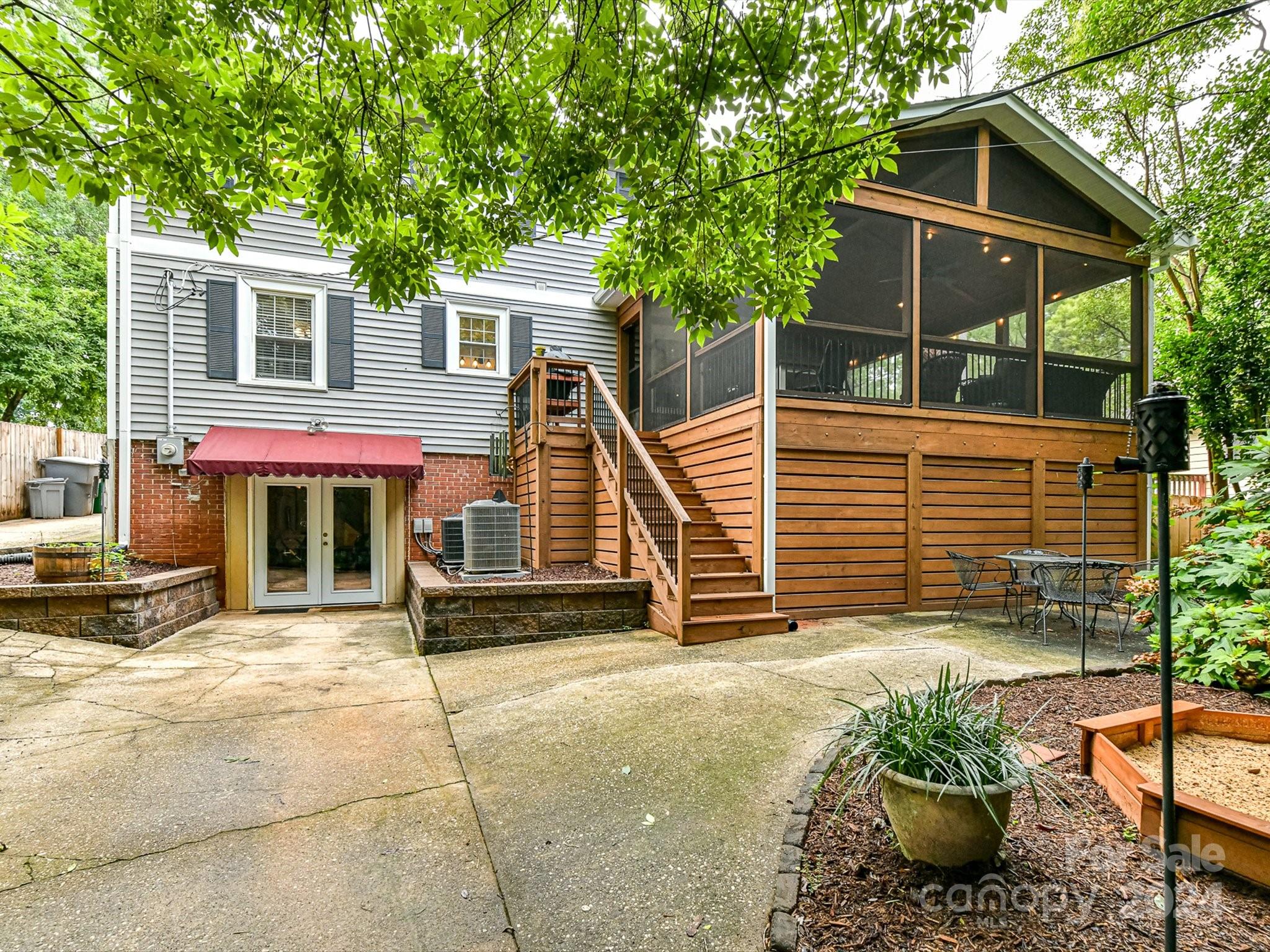 1309 Morningside Drive Charlotte, NC 28205 - Photo 29 of 41 a view of a house with a yard and a chair
