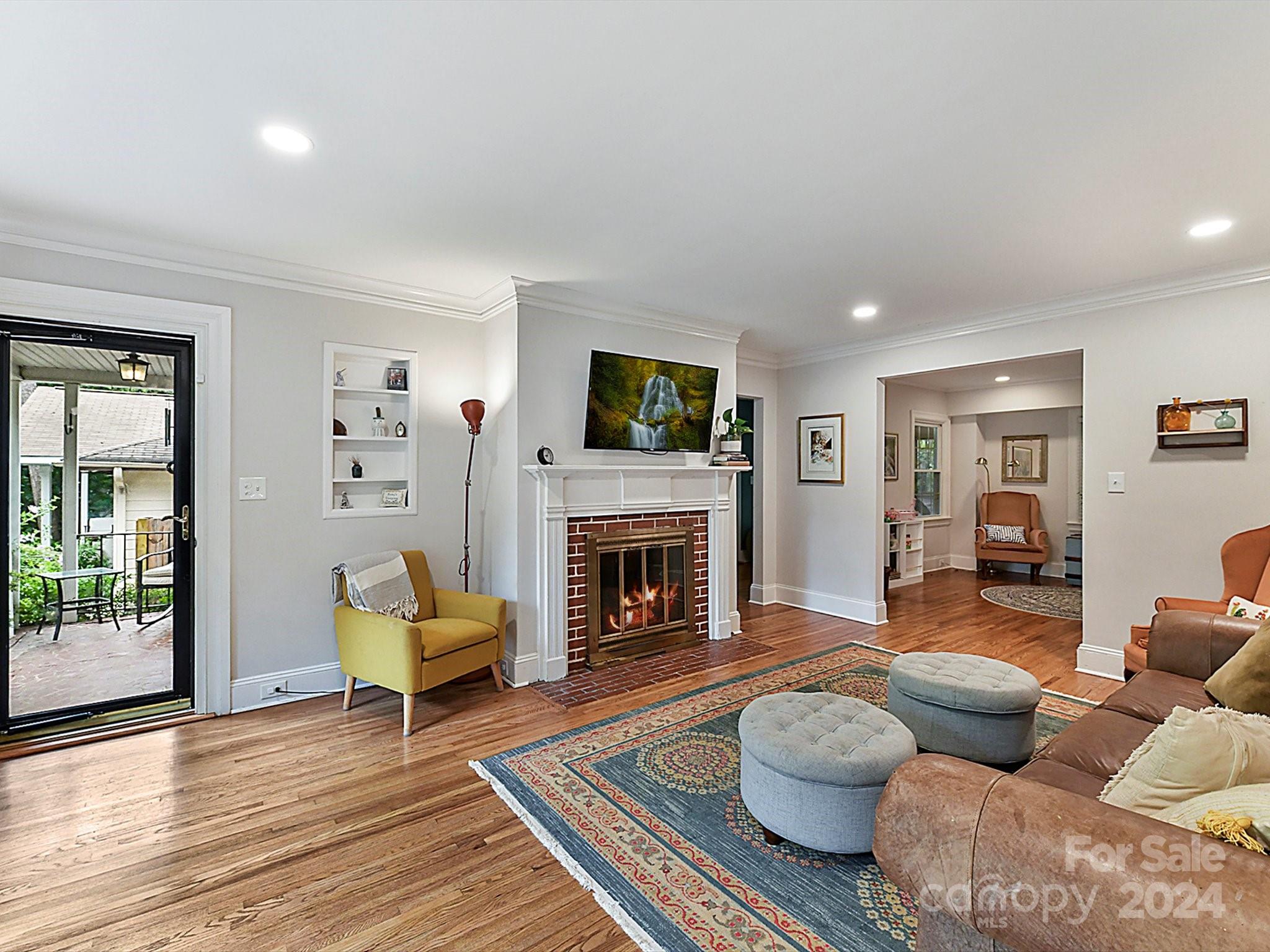 1309 Morningside Drive Charlotte, NC 28205 - Photo 4 of 41 a living room with furniture and a fireplace