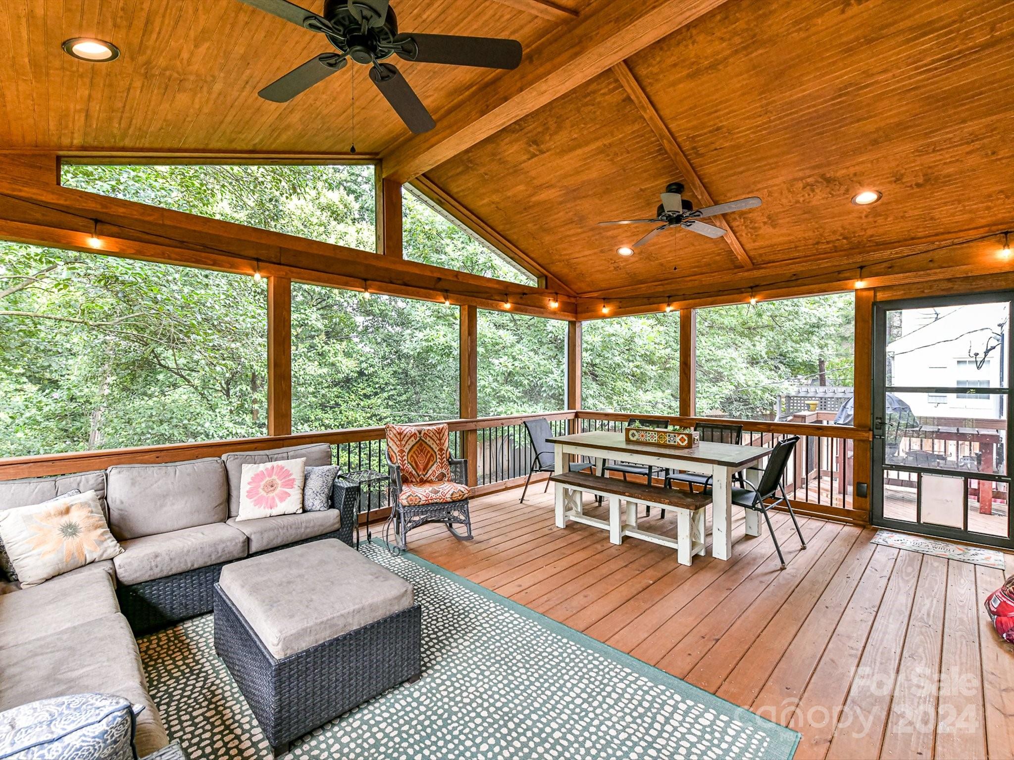 1309 Morningside Drive Charlotte, NC 28205 - Photo 8 of 41 a balcony with wooden floor and outdoor seating