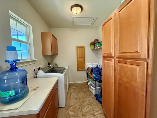 a bathroom with a sink a mirror and shower