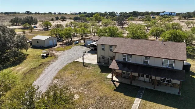 a view of yard with trees