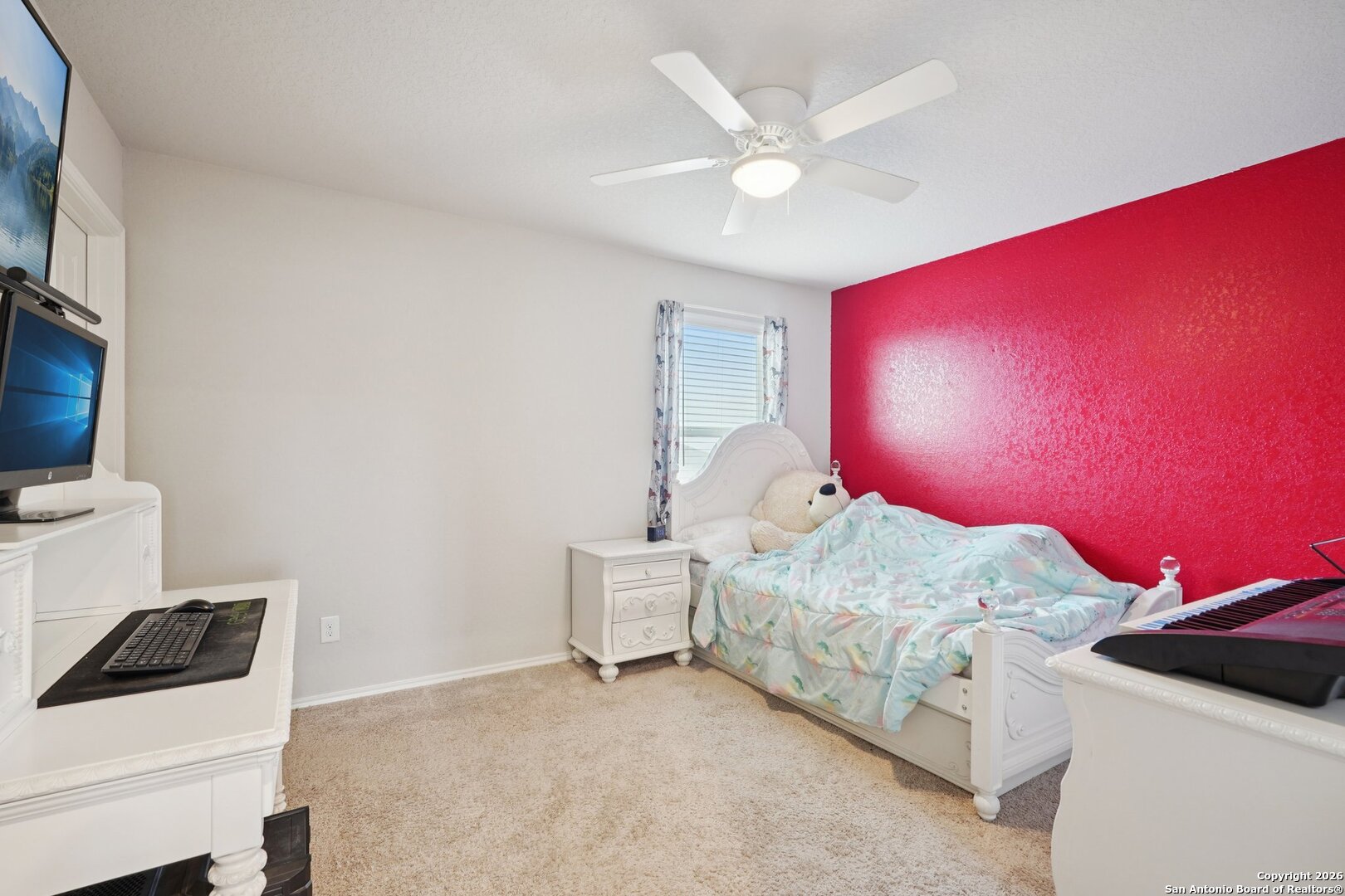 13030 Heathers Reef St. Hedwig, TX 78152 - Photo 20 of 51 a bedroom with a bed and a couch