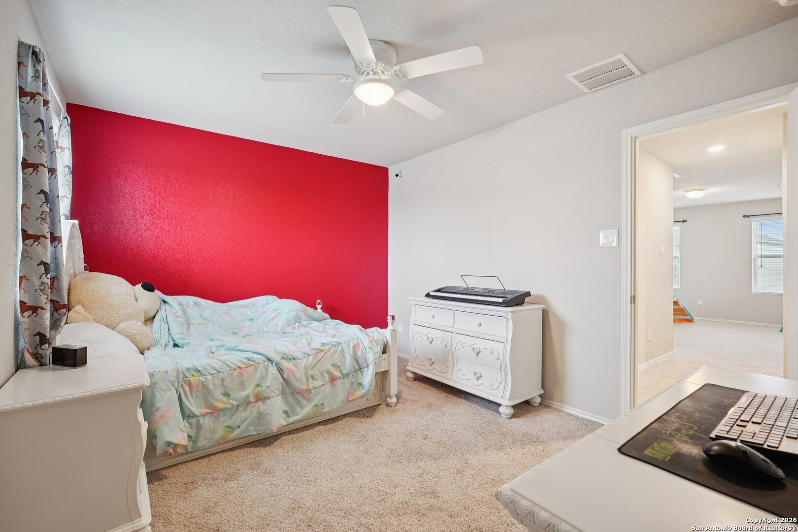 13030 Heathers Reef St. Hedwig, TX 78152 - Photo 21 of 51 a bedroom with a bed and a couch
